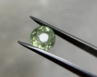 Natural Pale Green Paraiba Tourmaline: 1.77 ct Round Cut Gemstone
