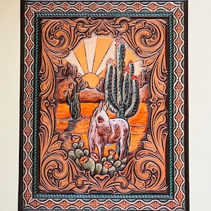 May include: A leather tooled wall hanging with a sunset scene, a burro, and a cactus. The scene is framed with a decorative border.