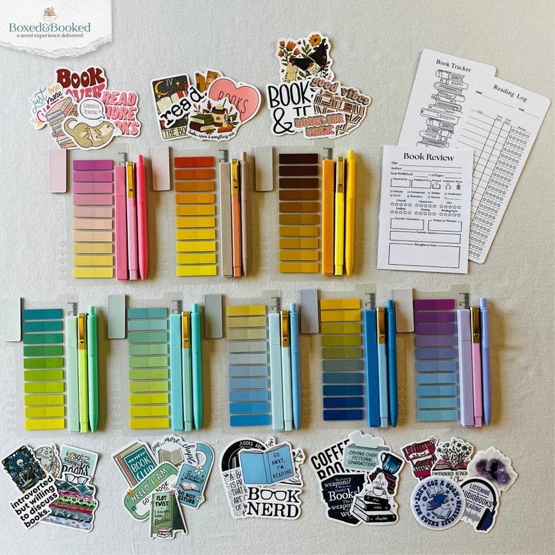 May include: A stationery set featuring colorful adhesive page markers, matching pens, and various book-themed stickers. Included are printed book review and reading log sheets. The items are arranged in rows with assorted color palettes.