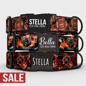 May include: Three personalized dog collars with black buckles. The collars feature a firefighter theme with red, orange, and black designs, including Maltese crosses, skulls, and flames. Each collar displays a name and phone number.