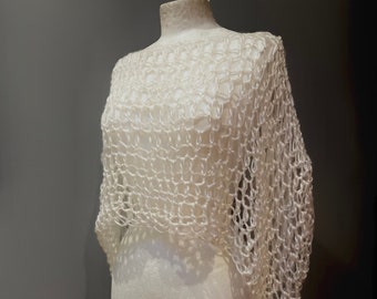 Crocheted merino and sparkle batwing top.