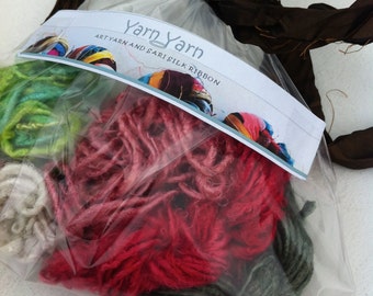 Mixed bag of banana yarn, silk sari ribbon and more. Experiment with a large sample pack. 100 grams.