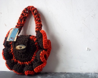 Chocolate brown and orange crochet pure rare breed Scottish wool purse. Hippy and unique. Handmade in Scotland.