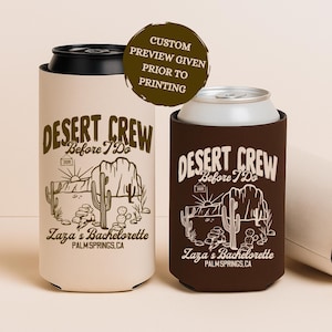 May include: Three beige and brown can coolers with the text "Desert Crew Before I Do" and a desert landscape graphic. One cooler is lying on its side. The text "Zaza's Bachelorette, Palm Springs, CA" is also printed on the coolers.