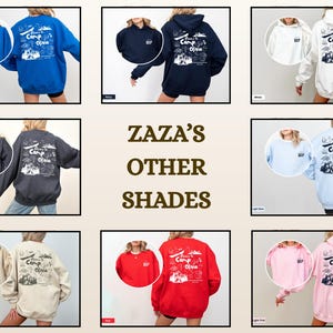 Puede incluir: Una colecci&oacute;n de nueve sudaderas y sudaderas con capucha de manga larga en varios colores, incluyendo azul real, marino, blanco, gris oscuro, azul claro, arena, rojo y rosa claro. Cada prenda presenta el texto Welcome to Camp Olivia en la espalda.