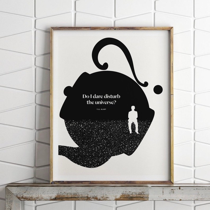 May include: Black and white print with a silhouette of a person standing in a large, round, black shape with a star-like pattern. The text "Do I dare disturb the universe?" is written in white on the black shape. The text "T.S. Eliot" is written in smaller white text below the quote.