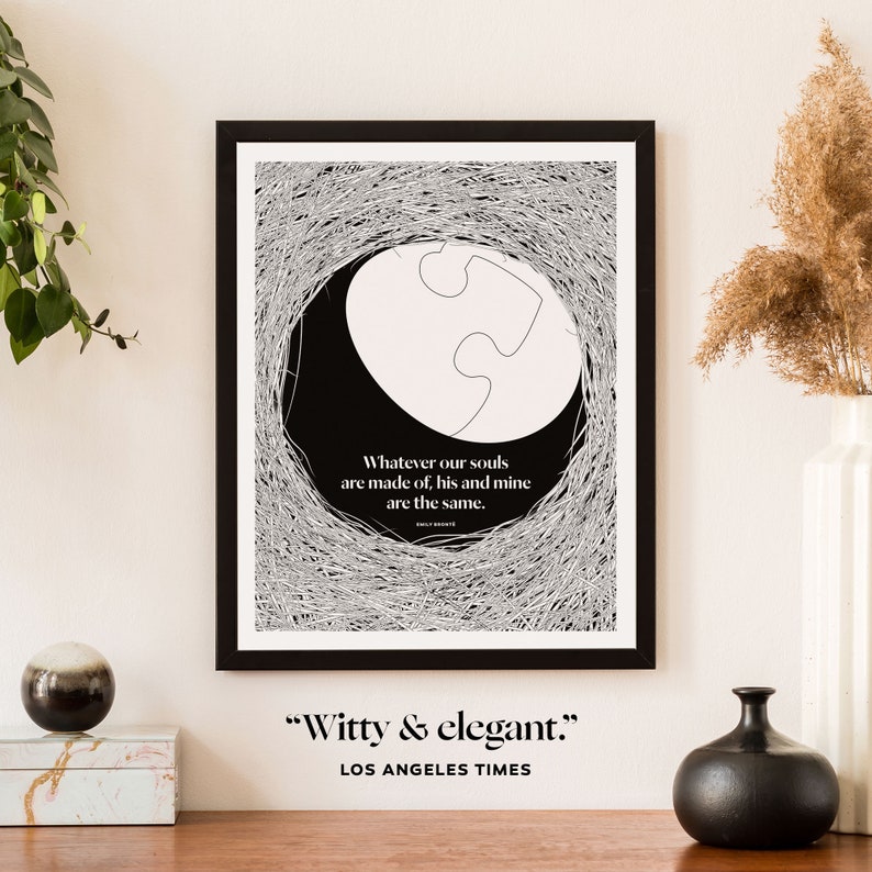 May include: Black and white print of a quote by Emily Bronte, "Whatever our souls are made of, his and mine are the same." The quote is surrounded by a black and white abstract design. The print is framed in a black frame.