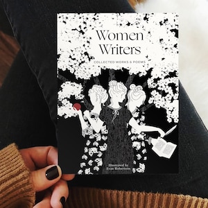 May include: A book cover with the title "Women Writers" and the subtitle "Collected Works & Poems". The cover features a black and white illustration of three women under a flowering tree. The artist's name, "Illustrated by Evan Robertson", is at the bottom.