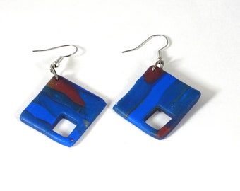 Aretes colgantes con forma de diamante azul y corte de diamante