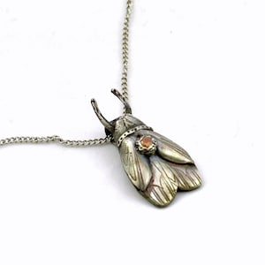 Colgante de plata - Insecto estilo Art Decó con circonita cúbica topacio