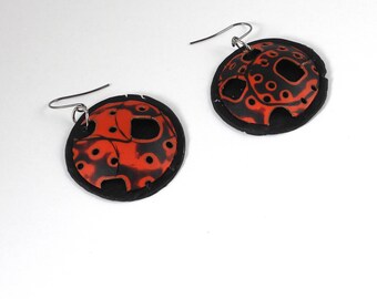 Red and Black Round Dangle with Holes and Circles