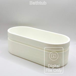 May include: A cream-colored, oval-shaped bathtub. The tub has a rectangular base and a rounded top edge. The image includes the text "Bathtub" at the top and a graphic with the text "Digital File Only".
