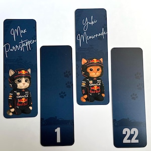 May include: Four bookmarks with a racing theme. Two bookmarks feature a cat in a racing suit and helmet with the names "Max Purrstappen" and "Yuki Meownada". The other two bookmarks have the numbers "1" and "22". All are on a blue background.