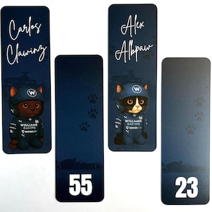 May include: Bookmarks featuring cartoon cats in racing attire. One bookmark reads "Carlos Clawing" and another "Alex Abpaw." The bookmarks have a dark blue background with paw prints and racing car silhouettes. Numbers 55 and 23 are also displayed.