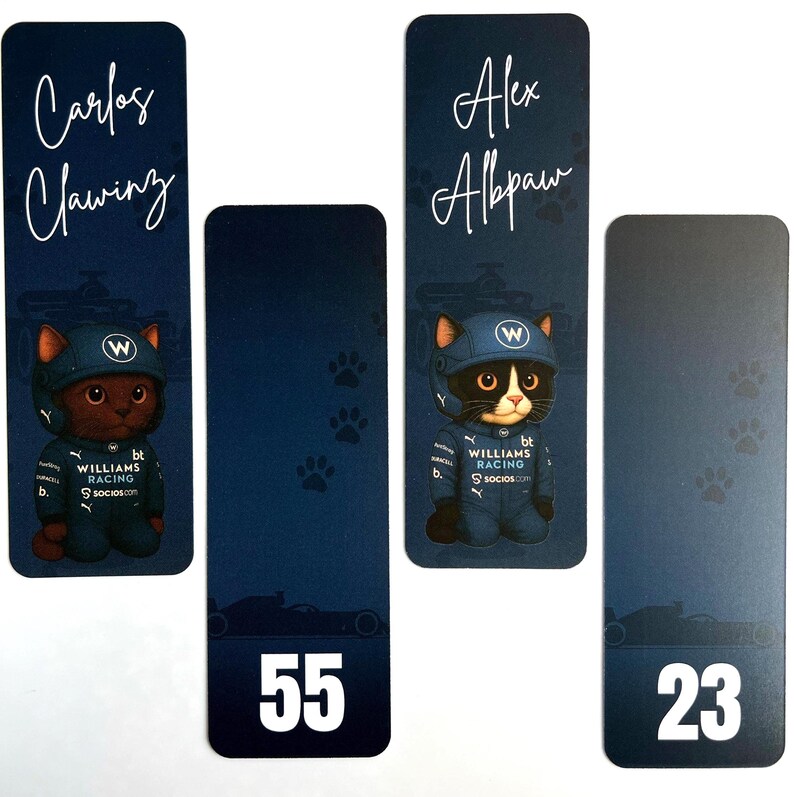 May include: Bookmarks featuring cartoon cats in racing attire. One bookmark reads "Carlos Clawing" and another "Alex Abpaw." The bookmarks have a dark blue background with paw prints and racing car silhouettes. Numbers 55 and 23 are also displayed.