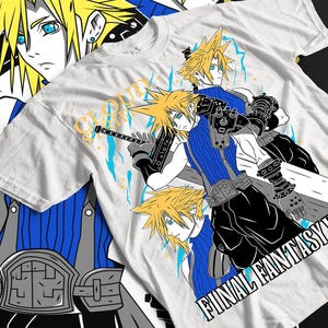 May include: White t-shirt featuring a graphic of a character with spiky yellow hair and blue eyes, holding a sword. The shirt has the words "CLOUD STRIFE" and "FINAL FANTASY" printed on it, with blue and yellow accents.
