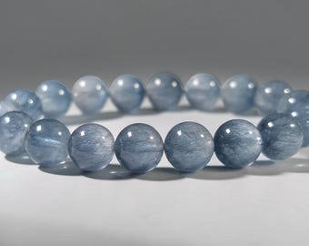 Armband med rutilerad kvarts och blått kaninhår