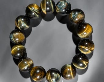 Drömlikt Tigerögaarmband 15 mm+ - Blått Guld Chatoyant Ädelstensmycken