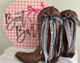 Game day GO TEAM! Printed black and white boot bows with lace, ribbons, organza, and gingham cowgirl boot accessories cheerleader cheer
