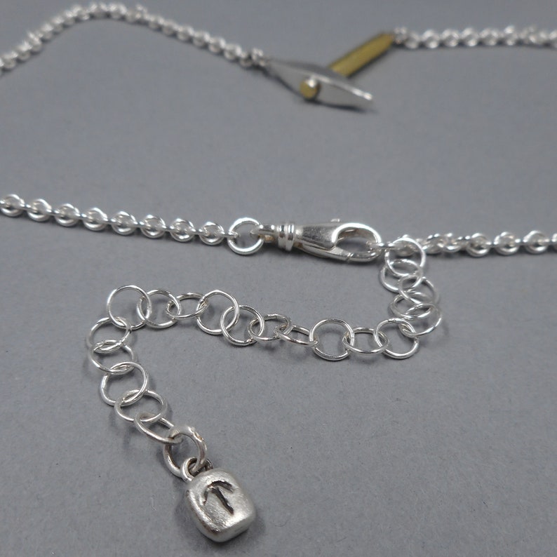 Pickaxe Necklace in Sterling Silver & 22k Gold from Forged Mettle Jewelry