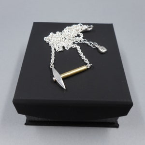 Pickaxe Necklace in Sterling Silver & 22k Gold from Forged Mettle Jewelry
