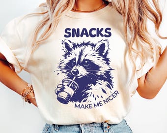 Funny Raccoon Snacks Make Me Nicer T-Shirt, Cute Animal Foodie Tee, Retro Vintage Snack Lover Shirt, Coffee Lover Gift for Women & Men