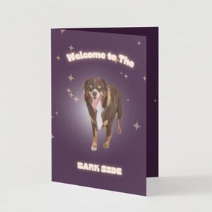 May include: A greeting card with a purple background and a dog illustration. The text "Welcome to the Bark Side" is displayed in a glowing font. The dog is brown, black, and white.