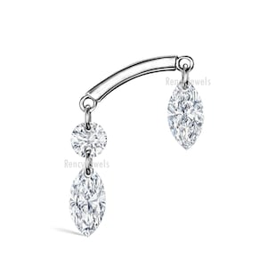 May include: A silver earring with three clear gemstones. The earring has a curved bar with a round gemstone and a marquise-cut gemstone hanging below. A marquise-cut gemstone hangs from the other end of the bar.