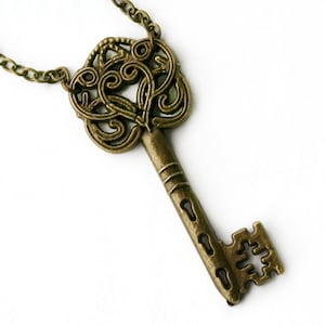 Collier clé squelette en laiton antique