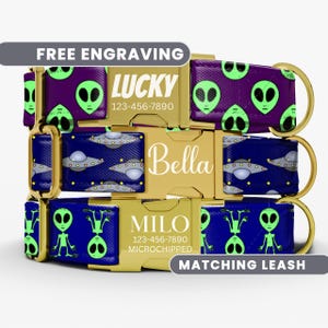 May include: Three pet collars with gold-tone metal buckles. The top collar is purple with green alien faces and the text LUCKY 123-456-7890. The middle is blue with UFOs and the text Bella. The bottom is blue with green aliens and MILO 123-456-7890 MICROCHIPPED.