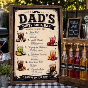 May include: A framed sign titled DAD'S DIRTY SODA BAR with a list of six drink recipes for Father's Day. The sign features illustrations of various sodas and ingredients. Next to it are six glass pump bottles labeled with syrup flavors.