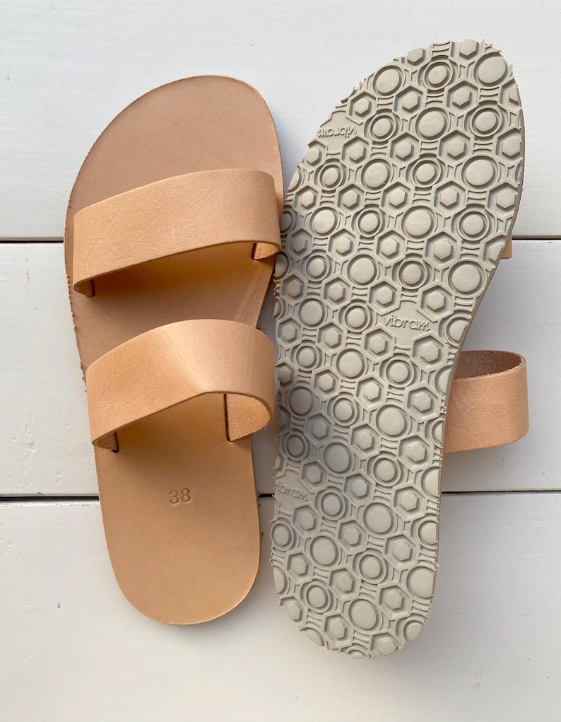 Close up of handmade leather slide sandals detail
