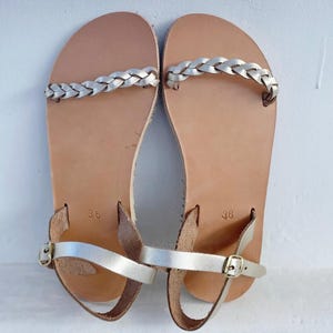 Top-down view of gold barefoot slides, showing the wide toe box that allows toes to spread naturally for maximum foot health and comfort.