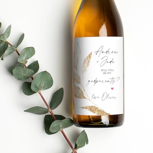 Le parrain et la marraine demandent une étiquette de vin, un cadeau en or pour la marraine, un cadeau pour la famille et les amis, une femme enceinte, des stickers pour bouteille de vin par parrain, un amateur de vin