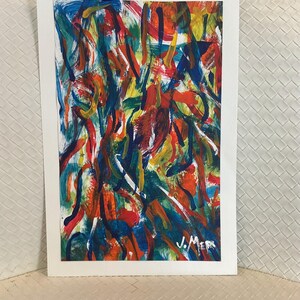 May include: Abstract painting with a white border. The artwork features bold brushstrokes in vibrant colors including red, blue, yellow, and orange. The artist's signature, "J. Merr", is visible in the lower right corner. The painting is on a white paper.
