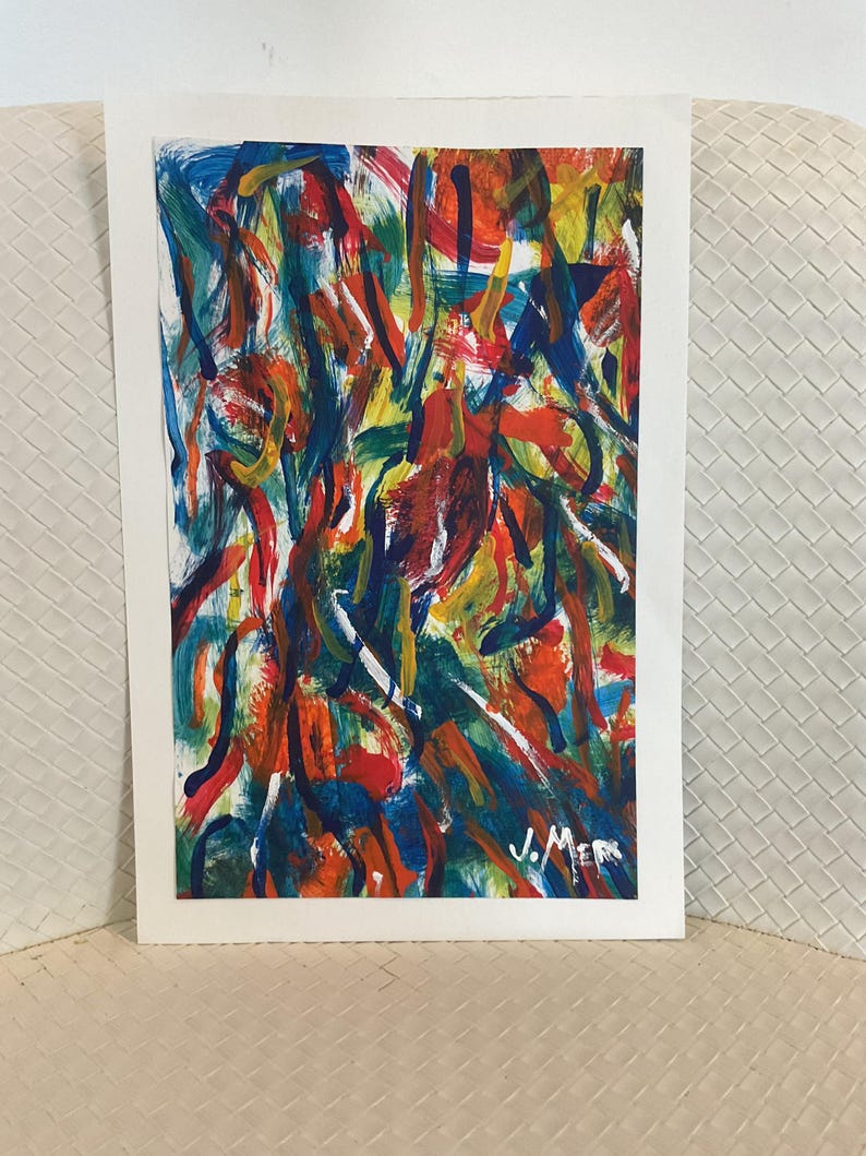 May include: Abstract painting with a white border. The artwork features bold brushstrokes in vibrant colors including red, blue, yellow, and orange. The artist's signature, "J. Merr", is visible in the lower right corner. The painting is on a white paper.