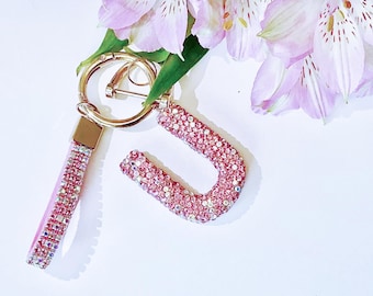 Llavero con inicial de diamantes de imitación rosas hecho a mano, adorno personalizado para bolso