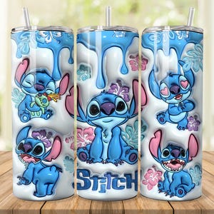 May include: Three blue and white tumblers featuring the character Stitch from Lilo & Stitch. The tumblers have a blue and white design with Stitch in various poses, surrounded by flowers. The word "Stitch" is printed on one of the tumblers.