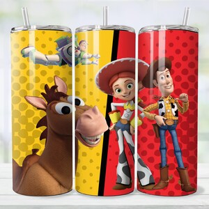 May include: A white ceramic mug with a black handle and the text "But First, Coffee" in a bold, black font. The mug is set against a blurred background, suggesting a cozy setting.