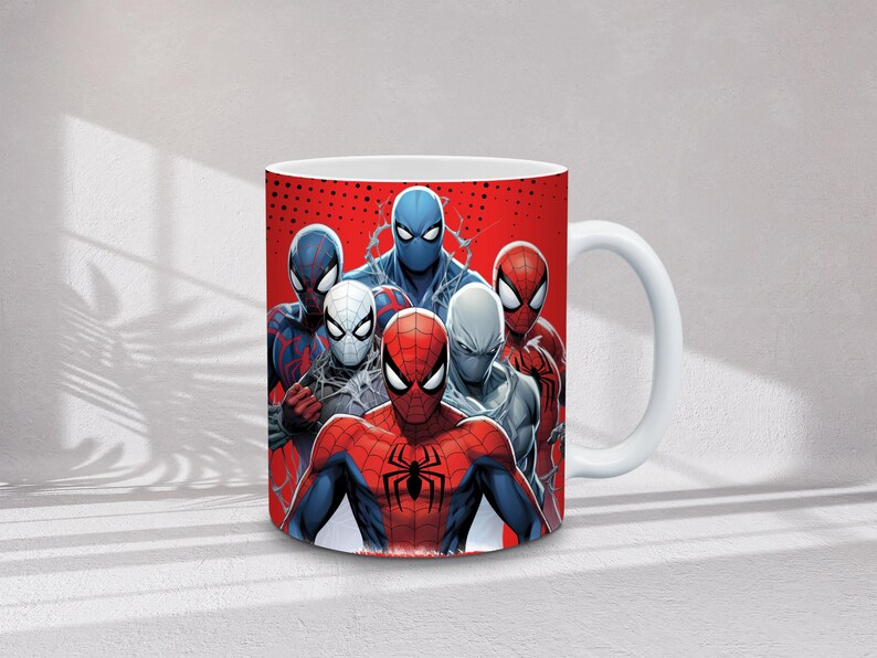 May include: White ceramic mug featuring a group of Spider-Man characters in various costumes against a red background. The design includes Spider-Man in red and blue, and other versions of the character.