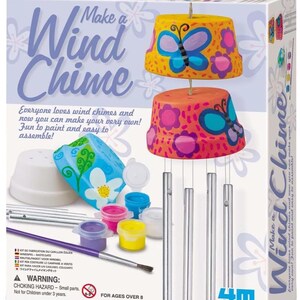 May include: A boxed wind chime craft kit. The box features painted wind chimes with butterfly and floral designs. The kit includes paint pots, a paintbrush, and metal chimes. Text on the box reads "Make a Wind Chime".