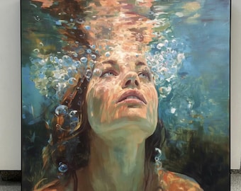 May include: A square framed painting depicts a person looking upwards through water, surrounded by bubbles. The person's face is illuminated with warm tones, contrasting with the cool blues and greens of the water. The artwork evokes a sense of serenity and wonder.