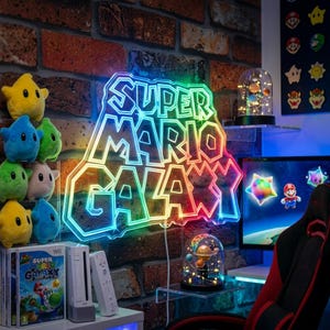 May include: A set of three ceramic mugs with a speckled, matte finish. The mugs are in shades of cream, light grey, and dark grey. Each mug has a simple, minimalist design, ideal for coffee or tea.