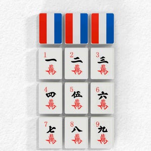 a collection of tiles with characters on them, arranged in a grid pattern.