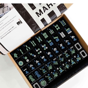 a box containing a set of mahjong tiles, with the text "Mahjong Set Only" visible.