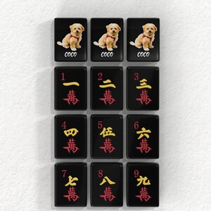 a collection of tiles with various characters and numbers on them, arranged in a grid-like pattern.
