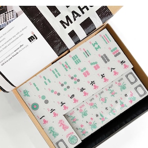 a box containing a set of mahjong tiles, with the text "Mahjong Set Only" visible.