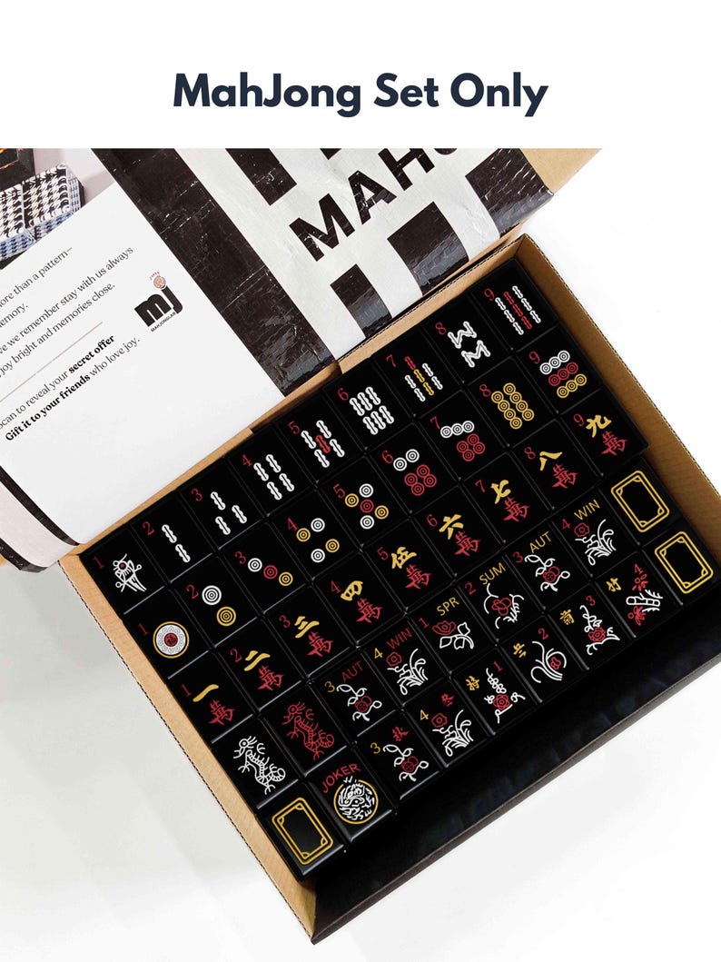 a set of mahjong tiles arranged in a box, with the text "Mahjong Set Only" visible.