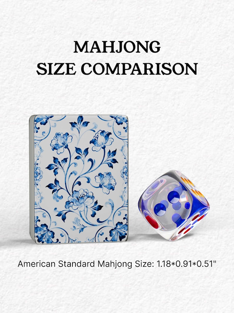 a Mah Jong-style game board with a floral pattern and a clear glass dice with colorful dots on it.