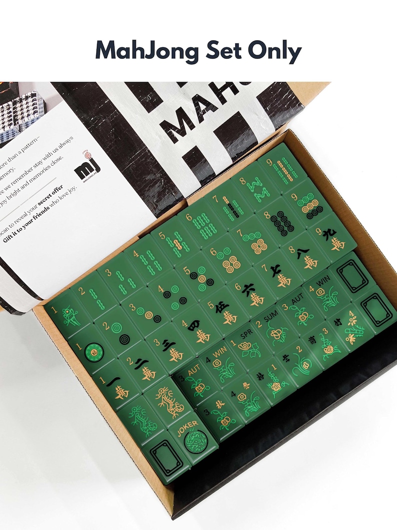 a box containing a set of mahjong tiles, with the tiles arranged in rows and columns.